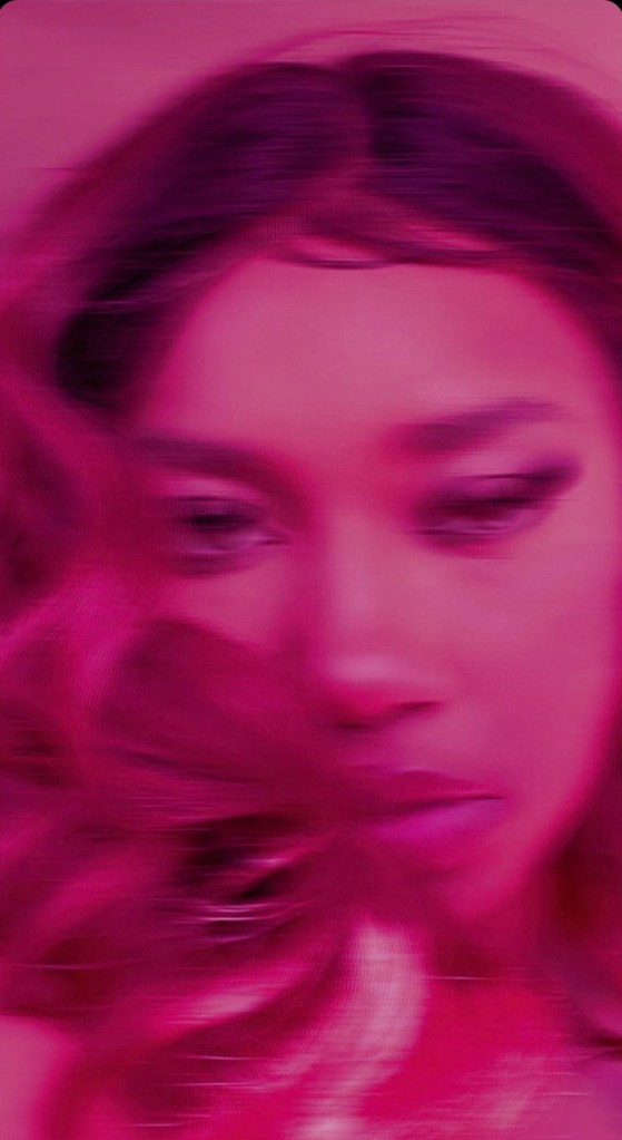 Motion-blurred pink portrait of Kyra Lashone
